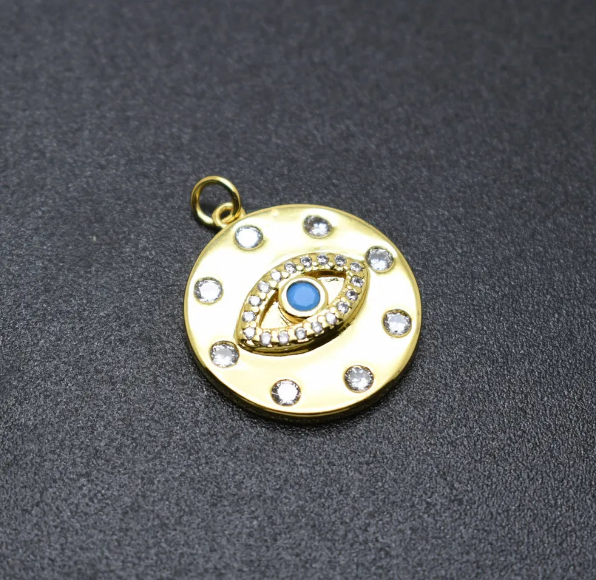 Light blue and gold eye pendant