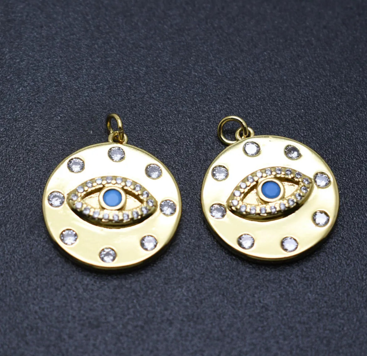 Light blue and gold eye pendant