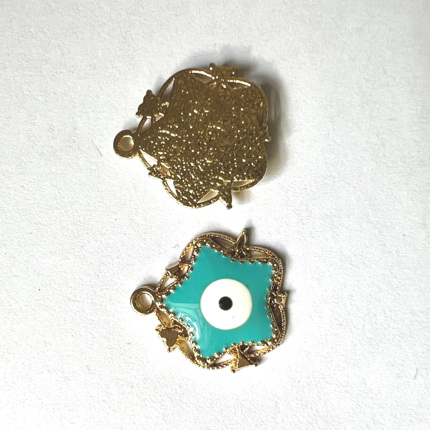 Star with evil eye pendant